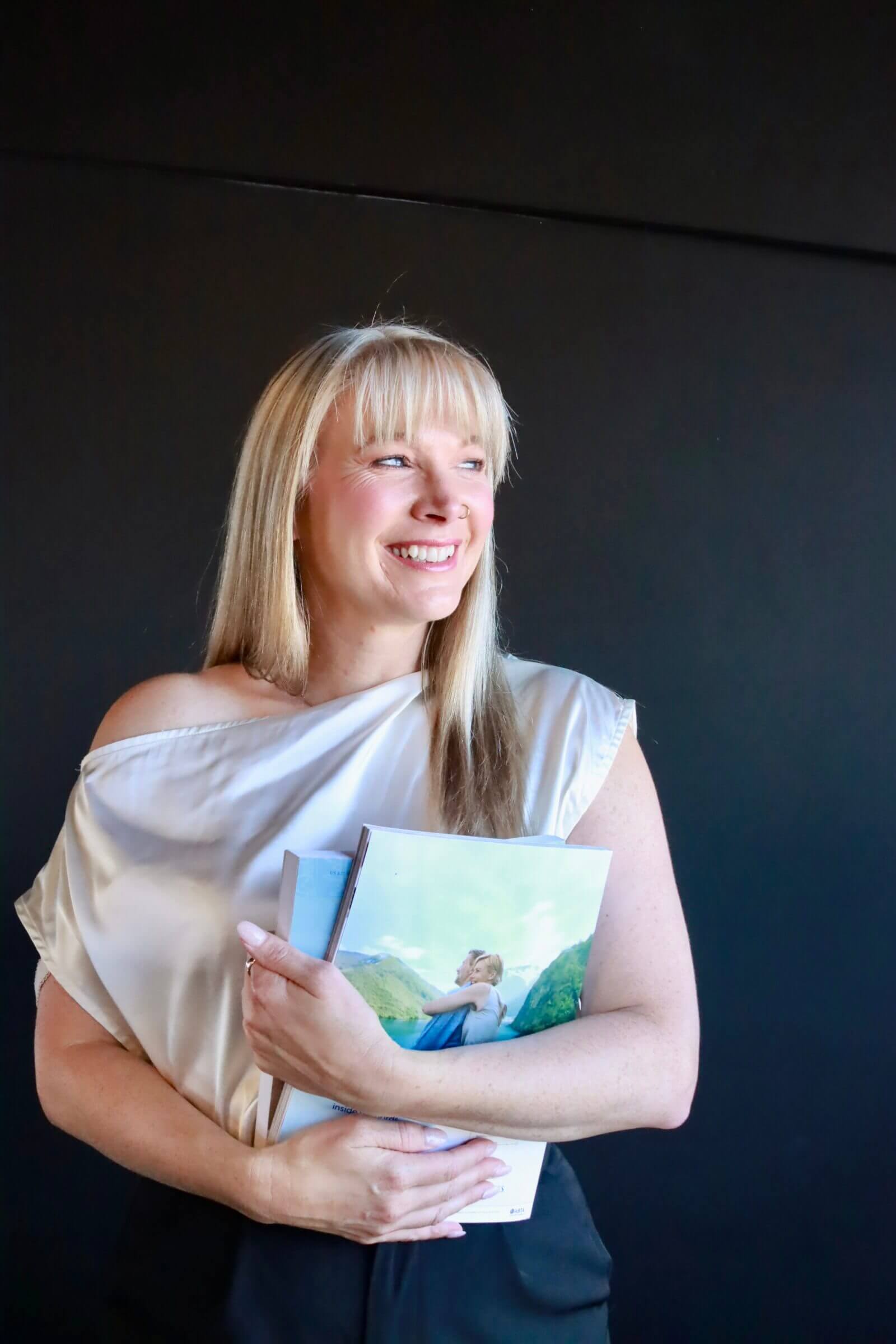 The Imperfect Therapist – Why Humanity Matters in the Therapy Room Therapist journaling in nature, embracing imperfection and authenticity in their counselling practice.