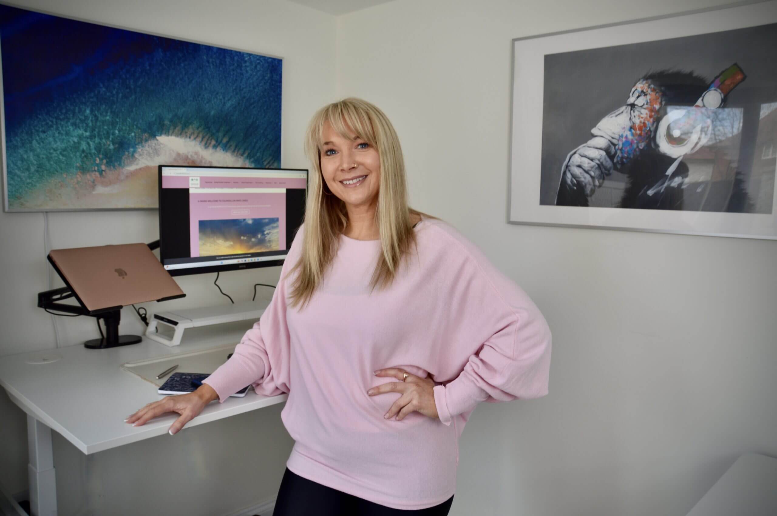 Becky Stone | Eating Disorder Therapist | Recovery & Mental Health Support Becky Stone, Eating Disorder Therapist, standing in her professional workspace, offering compassionate and expert support for individuals struggling with disordered eating and recovery