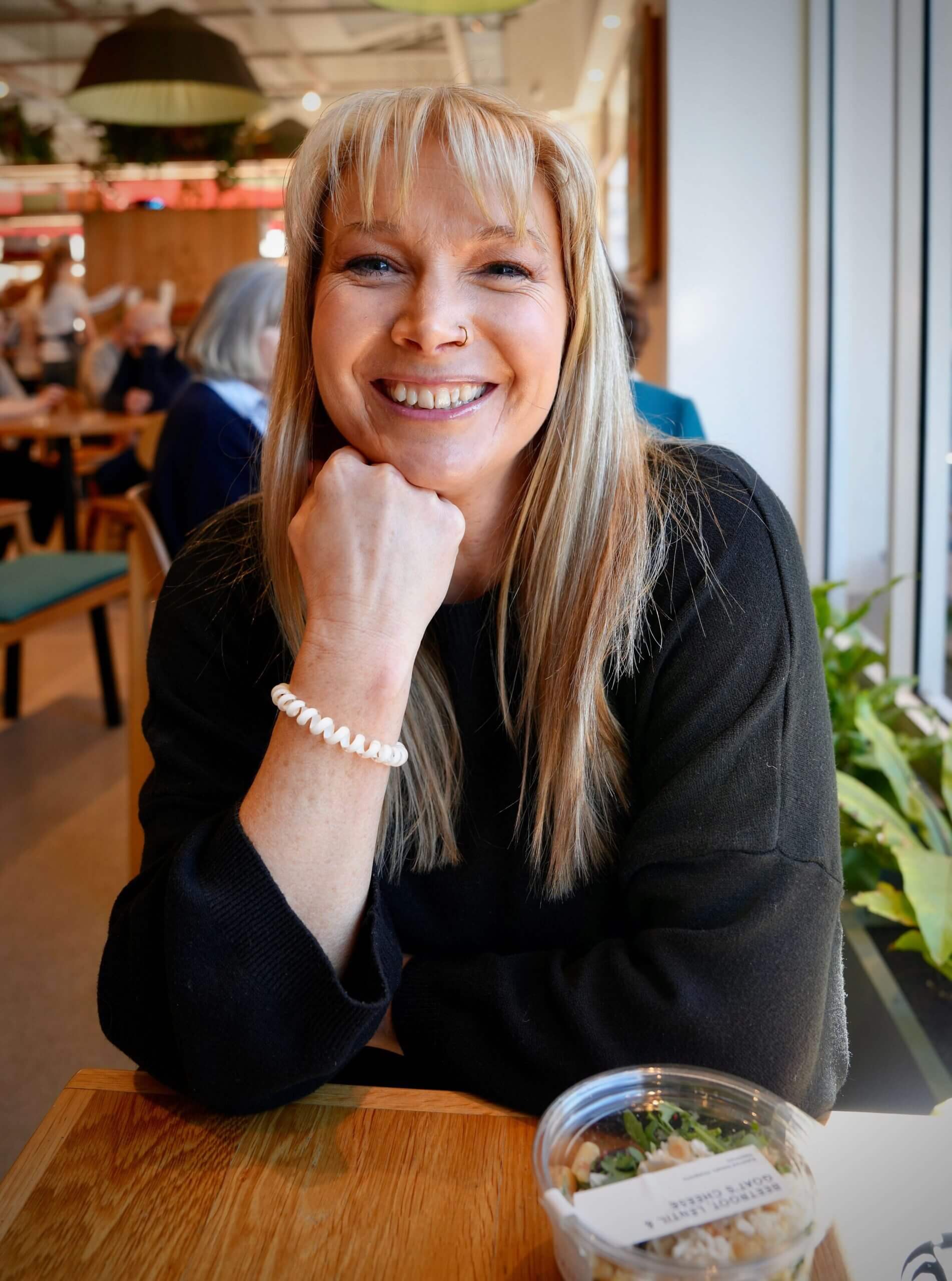 Becky Stone, a BACP-registered eating disorder therapist smiling at the camera