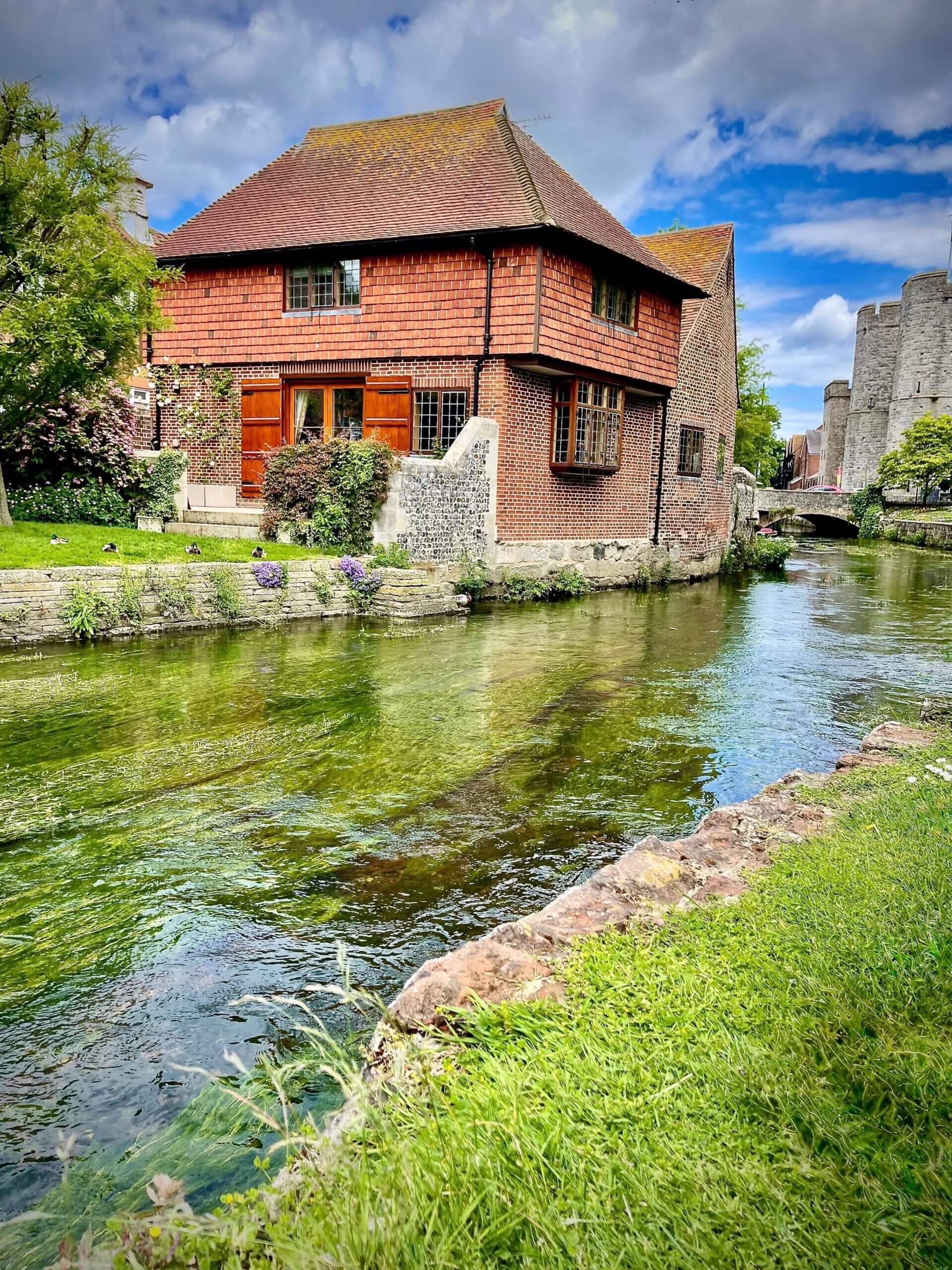 Counsellor Becky Stone is sitting in Westgate Gardens, Canterbury, offering neurodivergent-friendly therapy