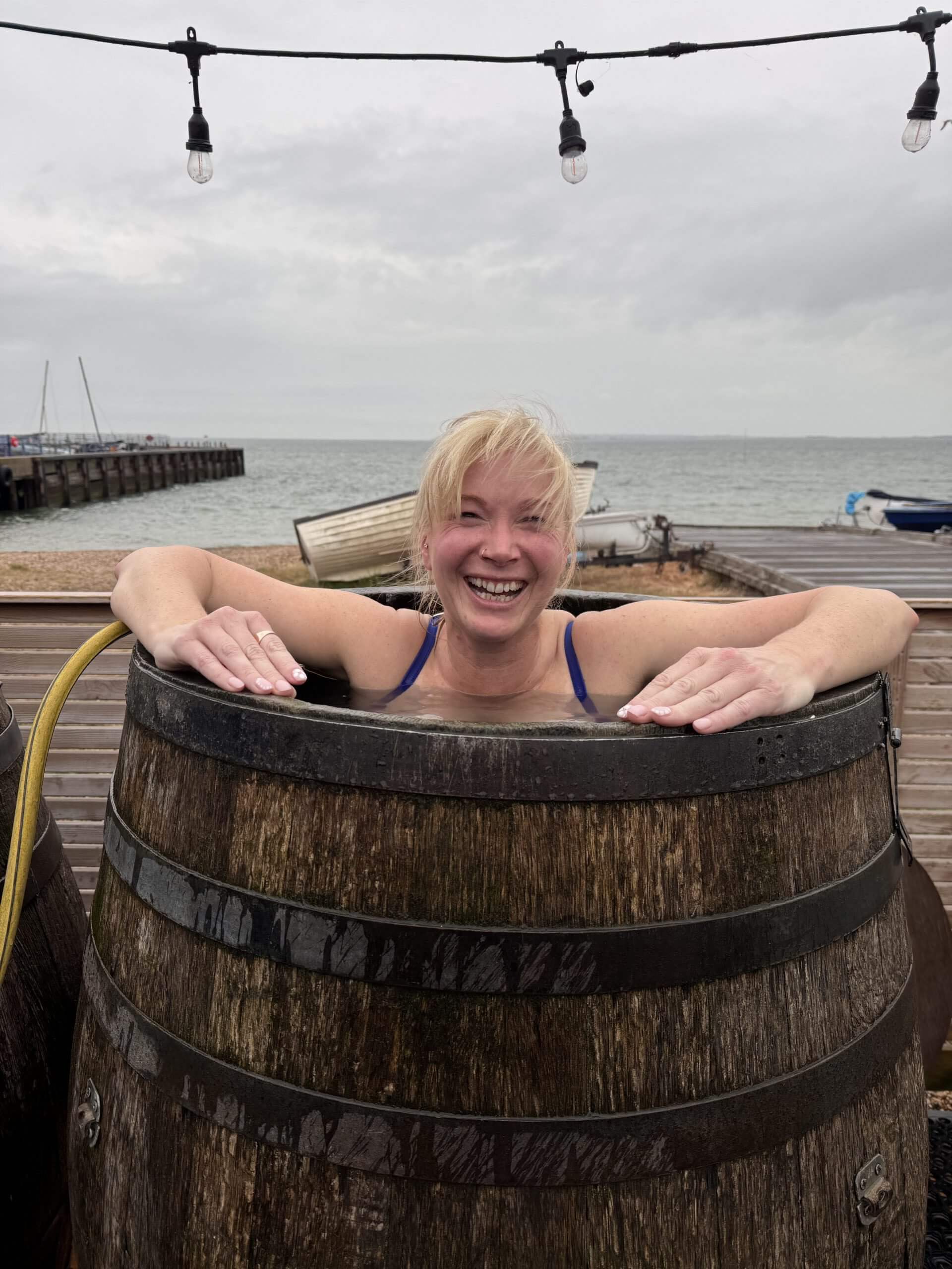 Becky Stone – Solo Beach Sauna for Body Confidence in Whitstable Becky Stone relaxing at a beach sauna in Whitstable, promoting body confidence and solo wellbeing for neurodivergent women