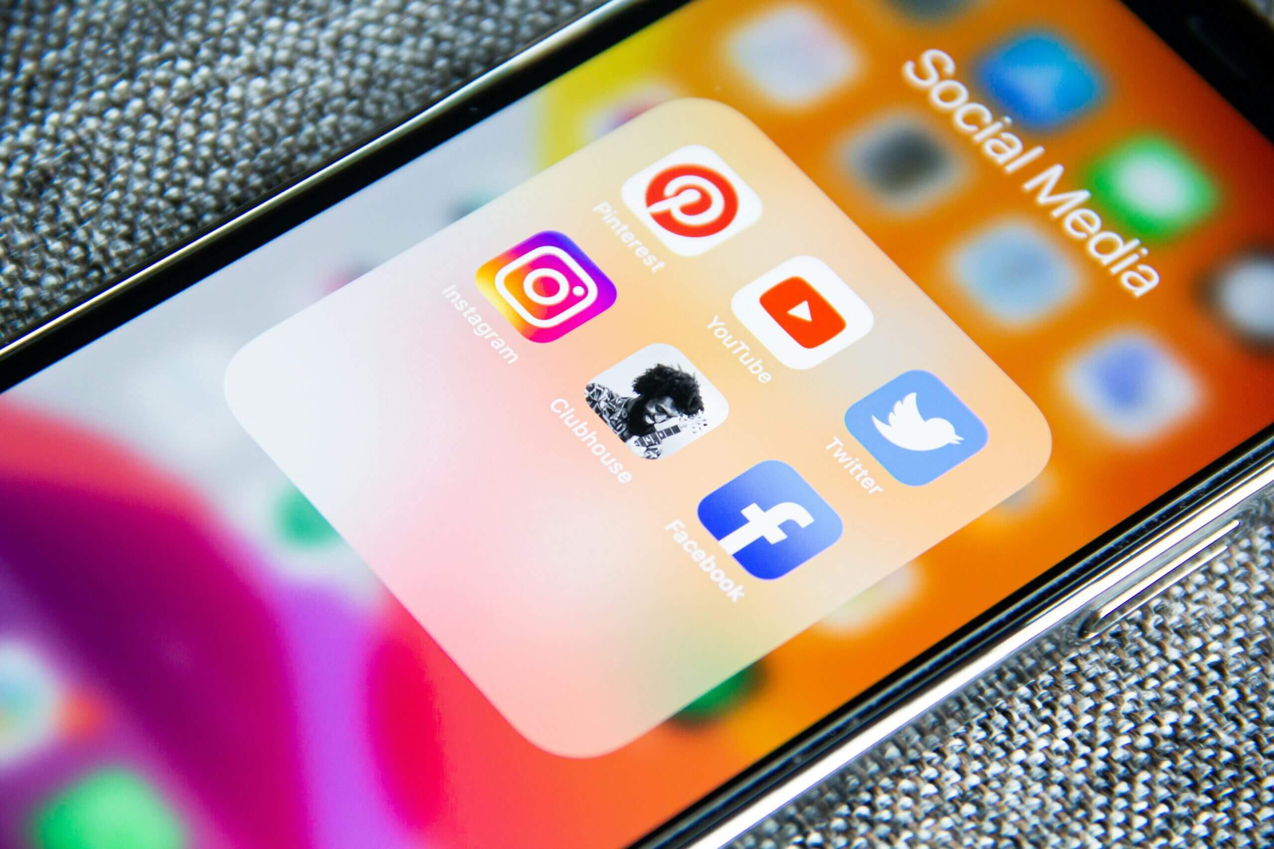 iPhone screen showing social media apps representing digital wellbeing, ADHD, and mental health therapy Canterbury