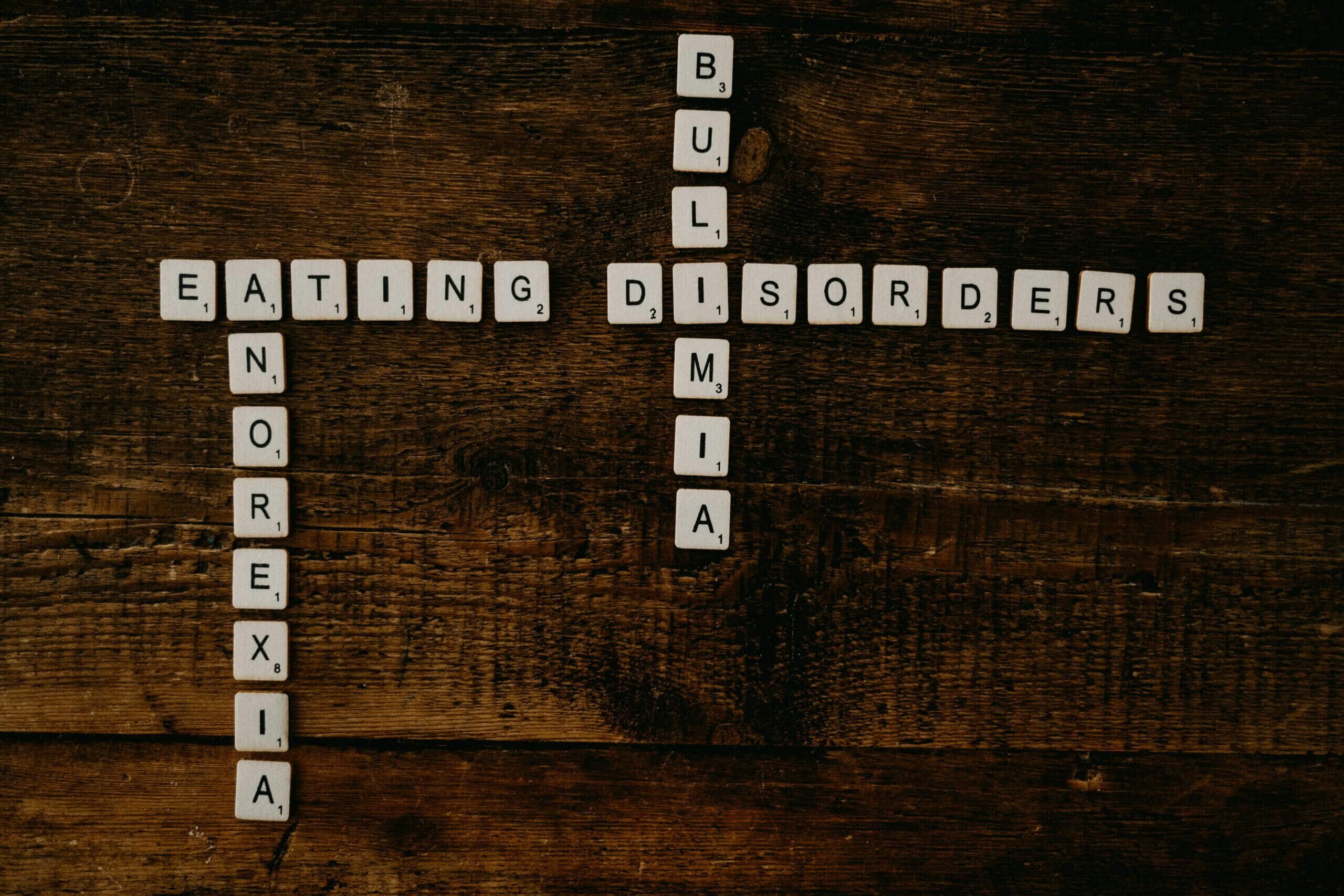 Eating Disorder Therapy Recovery Concept – Mental Health Puzzle Image Crossword therapy concept symbolising mental health puzzle and recovery journey – Eating Disorder Therapy support.