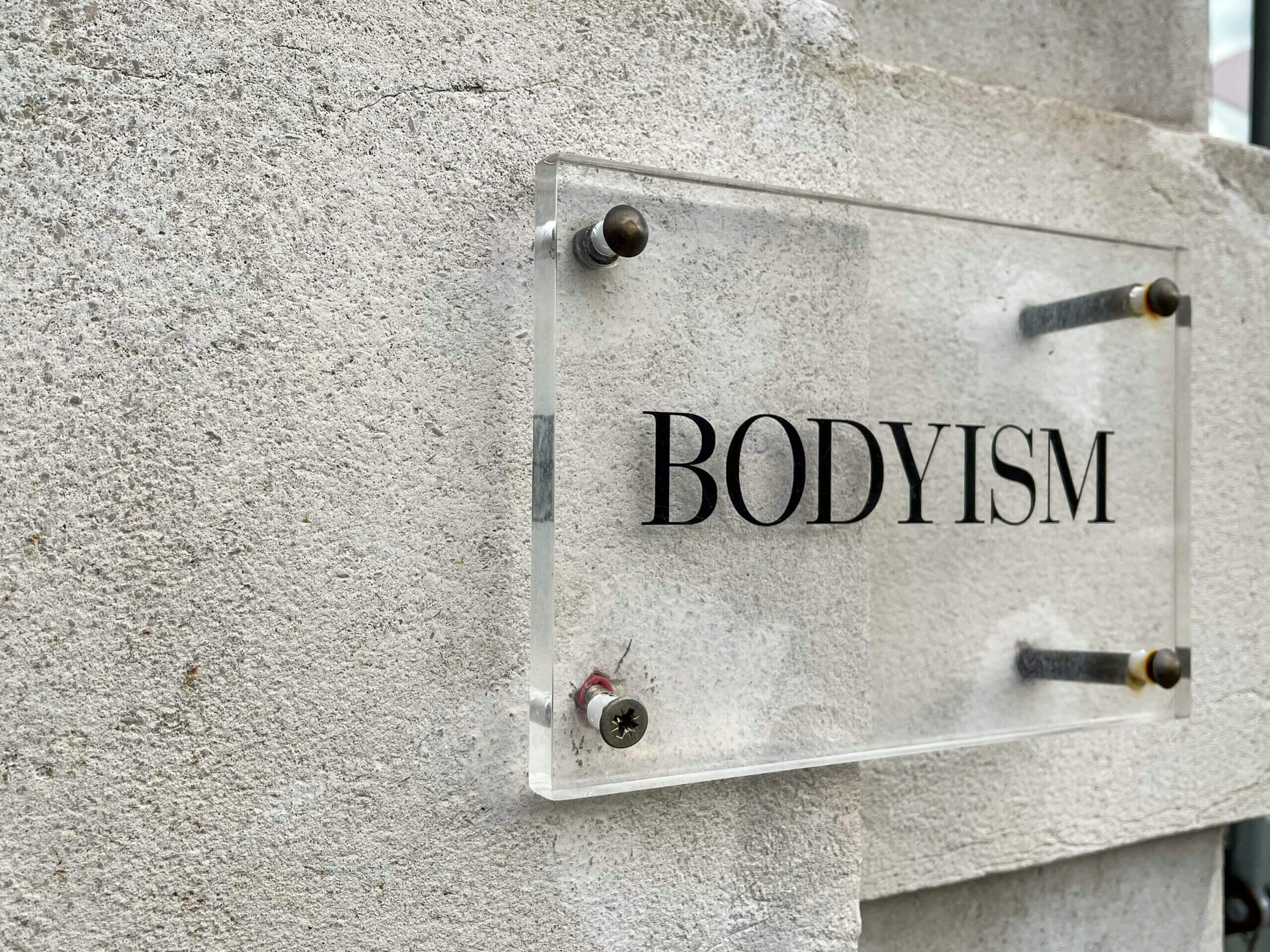 Body image therapy support – eating disorder recovery symbolism Stone engraving with the word “BODY” symbolising body image and eating disorder recovery.