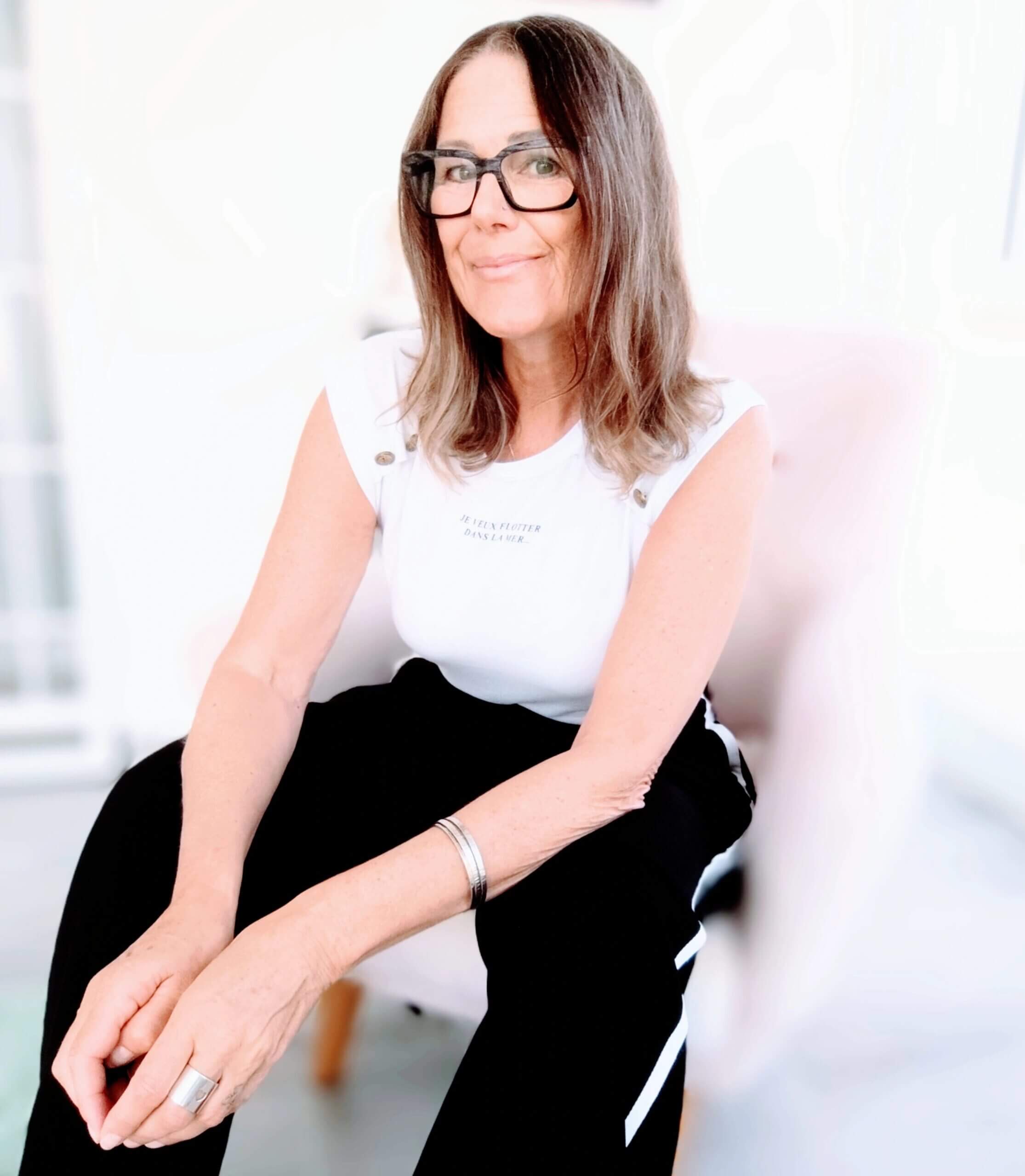 Mel Lay, private practice marketing coach, reviewing therapist website content to improve visibility in AI search tools and Google
