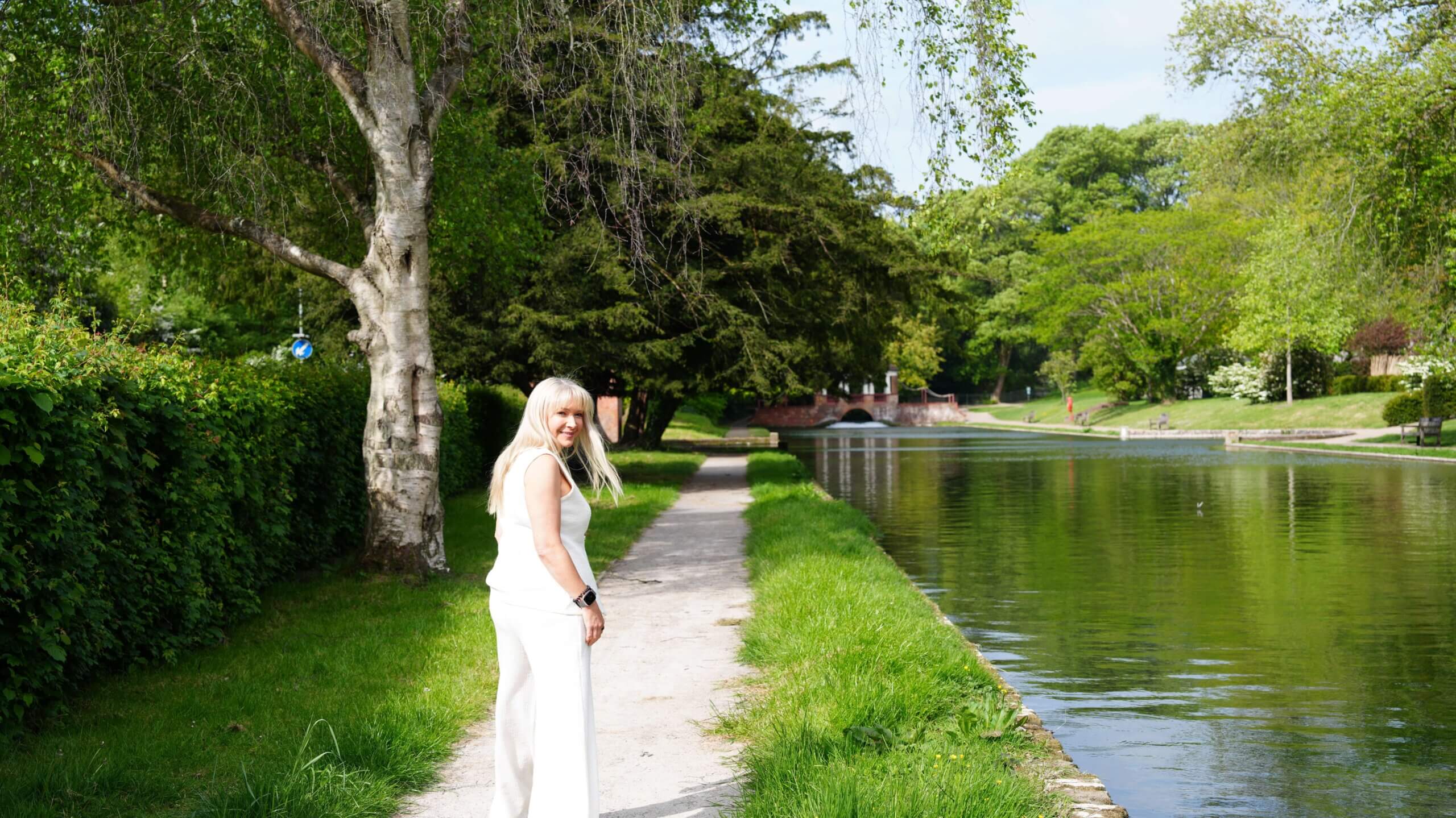 Support, Connection and Being There for Someone | Becky Stone Counselling A hand reaching out while walking outdoors, symbolising support, connection, emotional wellbeing and being there for someone during difficult times.