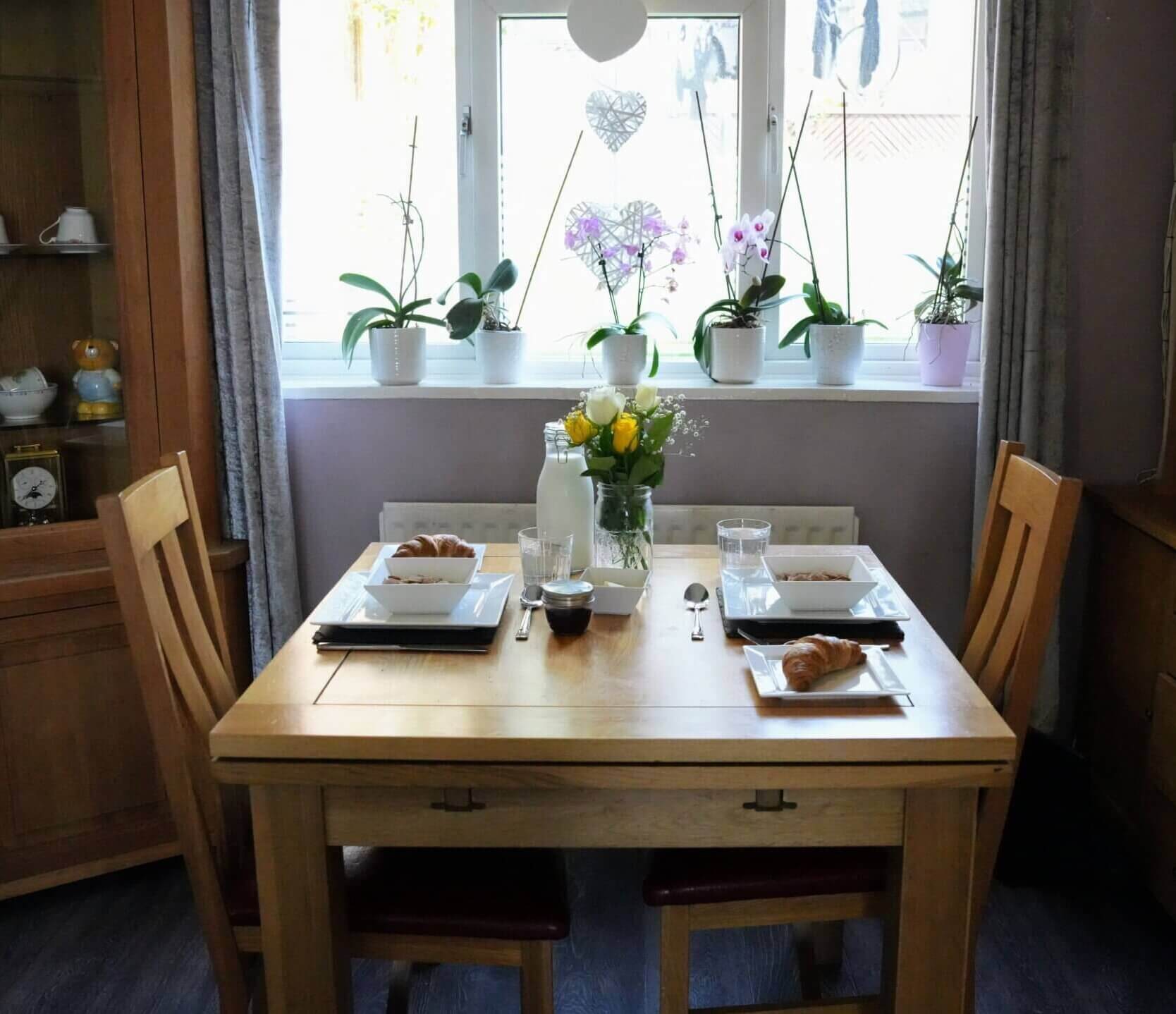 A welcoming table set for two, representing friendship, connection and rebuilding relationships during eating disorder recovery.