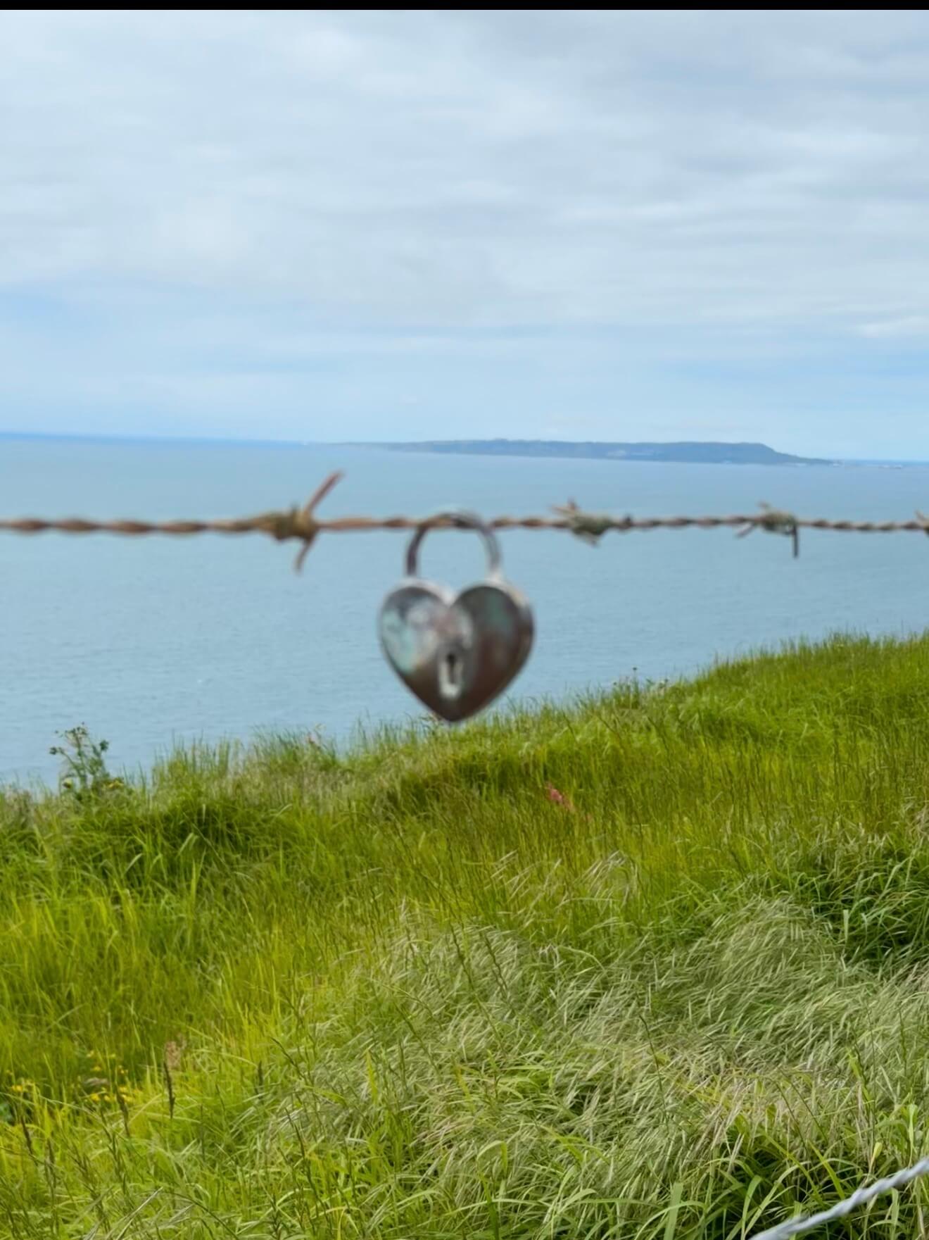 Person swinging freely through the air, symbolising breaking free from self-doubt and moving forward with confidence.