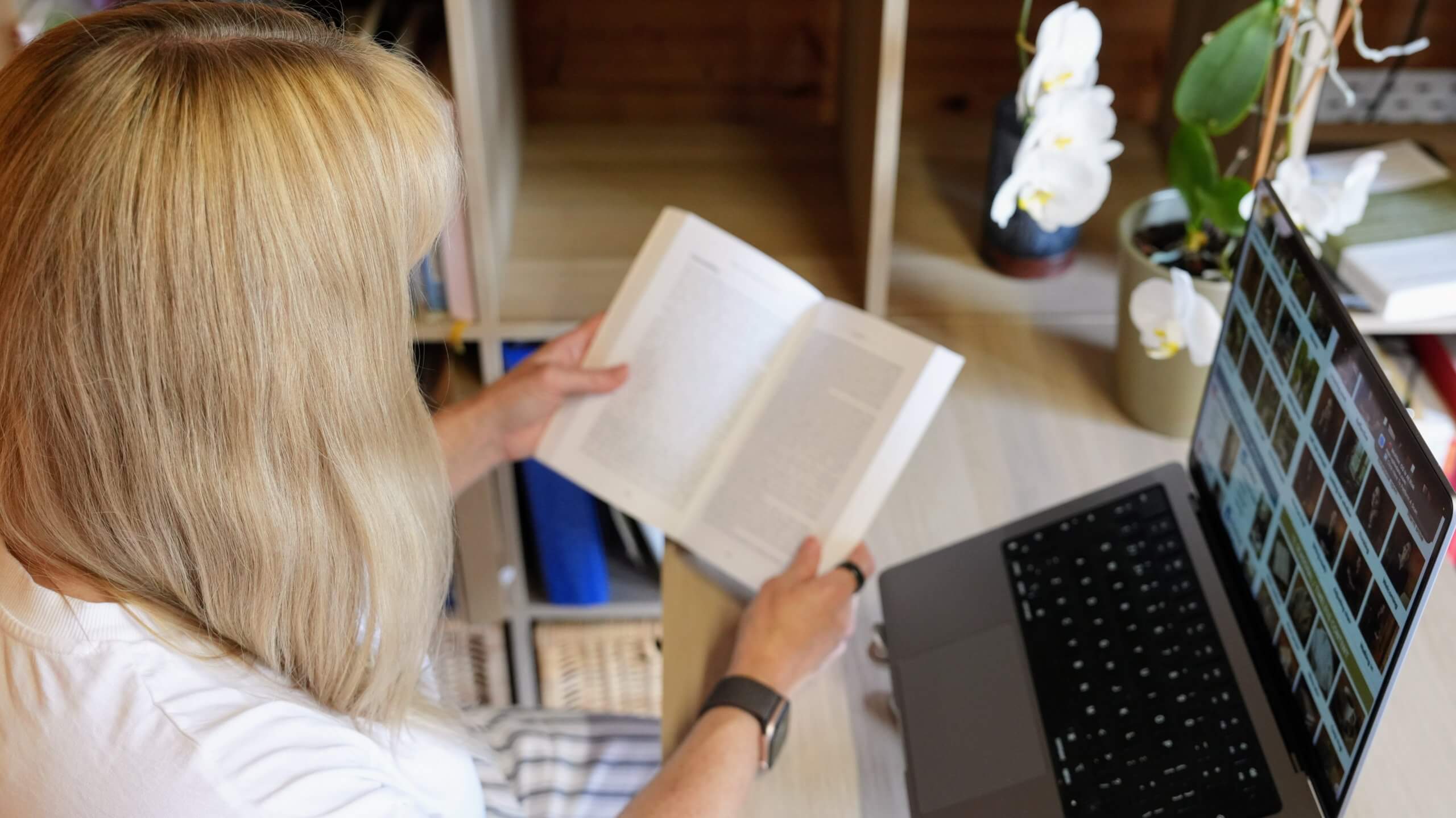 Rebecca Stone | Evidence-Based ADHD Coaching Rebecca Stone reviewing professional resources for ADHD coaching in her Canterbury office.